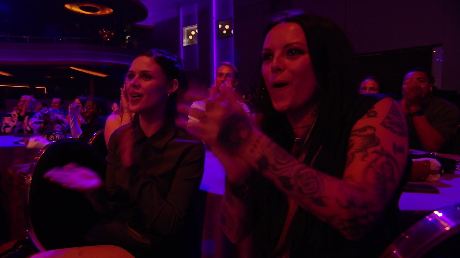 The audience applauds